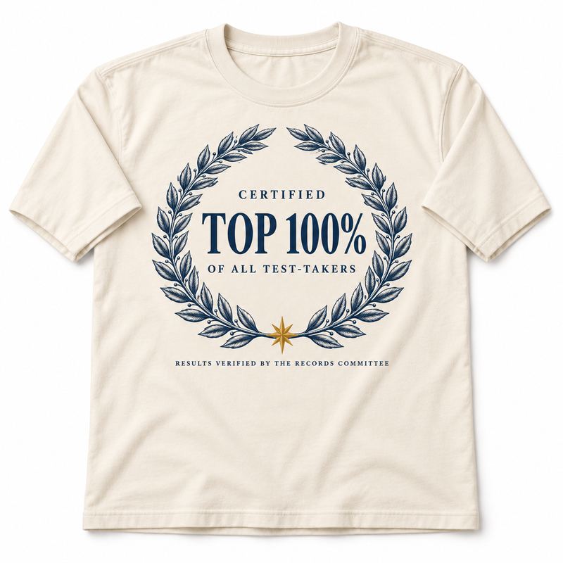 An ivory T-shirt with a navy laurel crest reading CERTIFIED TOP 100% OF ALL TEST-TAKERS, results verified by the Records Committee.