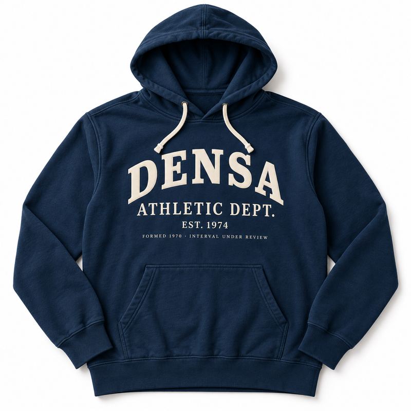 A heavyweight navy hooded sweatshirt with a cream collegiate crest reading DENSA ATHLETIC DEPT., EST. 1974.
